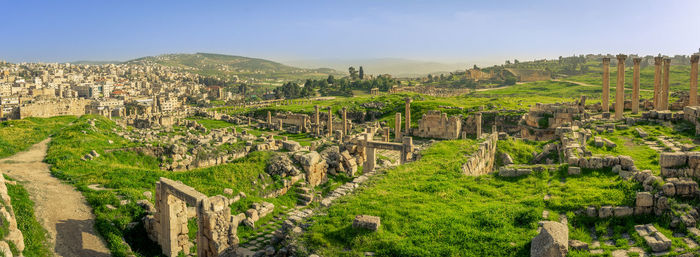 Panorama overview of the roman site of gerasa, jerash, jordan, with ruins, pillars and remains