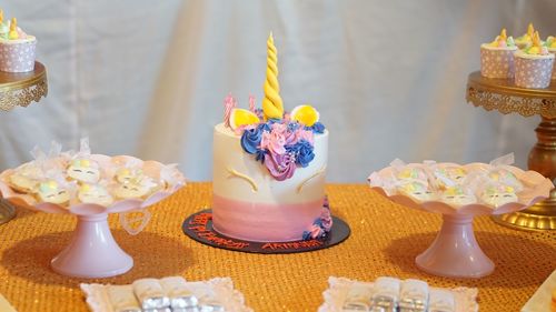 Close-up of cake with candles on table