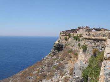 Scenic view of sea against clear blue sky