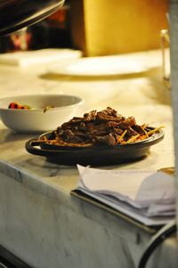 Close-up of food in plate on table