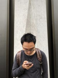 Young man using mobile phone