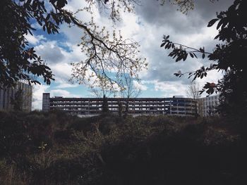 View of building against cloudy sky
