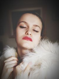 Portrait of young woman with eyes closed