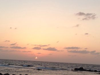 Scenic view of sea at sunset