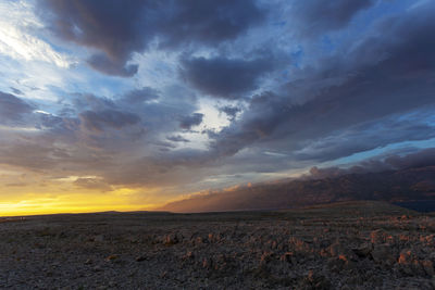 Scenic view of landscape against sky during sunset