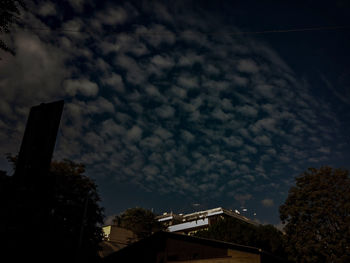 High section of building against cloudy sky
