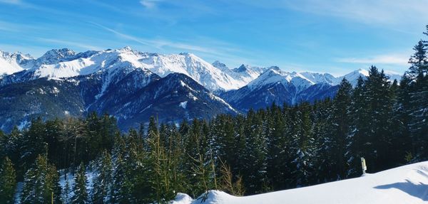 Snowcapped mountains against sky