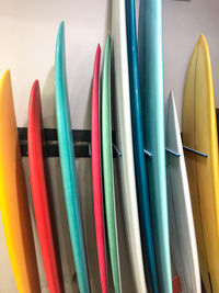 Close-up of colored surfboards