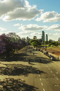 Road in city against sky