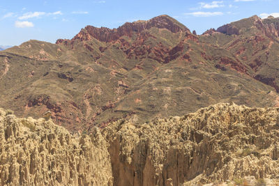 Scenic view of rocky mountains against sky