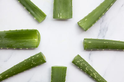 High angle view of chopped vegetables against white background