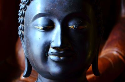 Close-up portrait of buddha statue