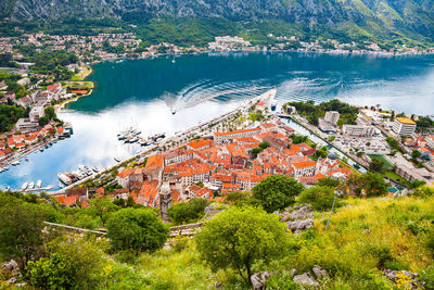 High angle view of river by houses in town
