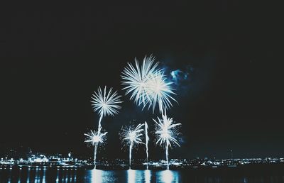 Firework display at night