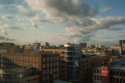 High angle view of buildings in city against sky