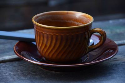 High angle view of coffee cup on table