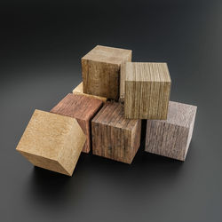 Close-up of wooden blocks on black background