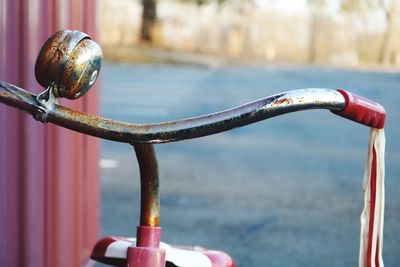 Close-up of bicycle on road