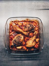 Roasted chicken with vegetables in tomato sauce