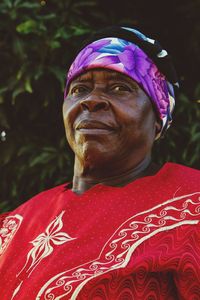 Close-up portrait of senior man wearing bandana