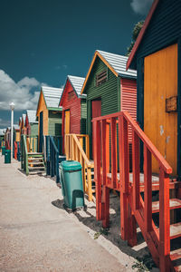 Houses on beach by buildings against sky in south africa cape town beach houses