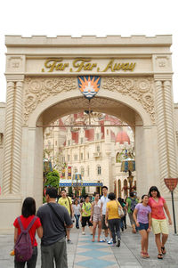 Group of people in front of historical building