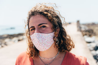 Portrait of beautiful woman wearing face mask