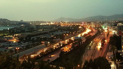 High angle view of illuminated city at night