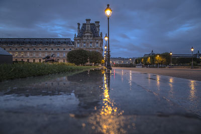 Reflection of illuminated buildings in water