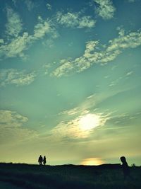 Scenic view of landscape at sunset