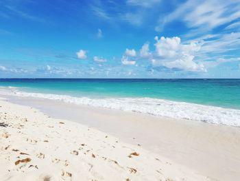 Scenic view of beach against sky