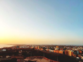 High angle view of townscape against sky during sunset