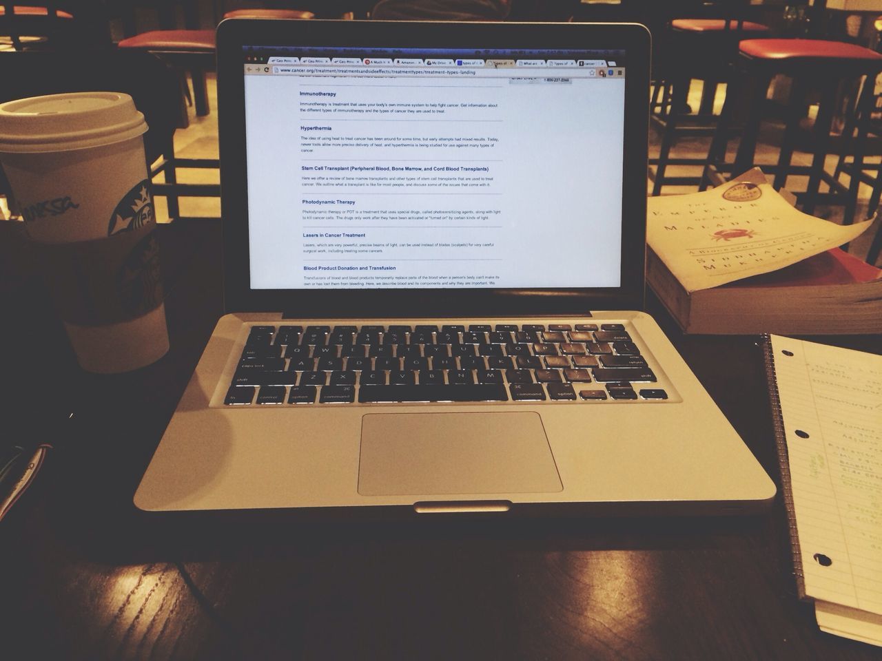 indoors, table, chair, communication, book, high angle view, technology, absence, text, desk, still life, laptop, education, computer, restaurant, wireless technology, no people, home interior, office, empty