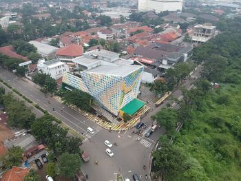 High angle view of street amidst buildings in city