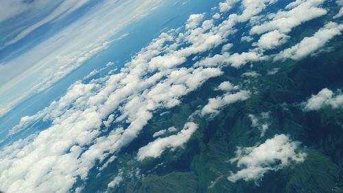 Aerial view of cloudscape over landscape