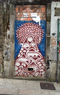 Close-up of text on brick wall