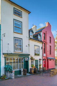 Street with bright colored houses in kinsale, ireland