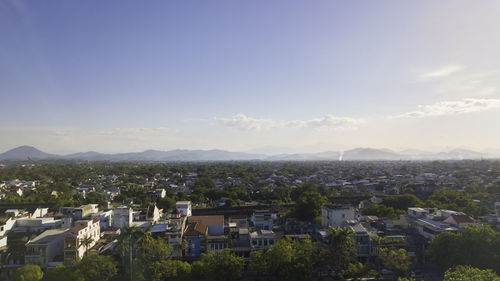 High angle view of buildings against sky