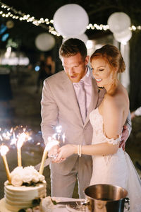 Portrait of smiling couple holding hands