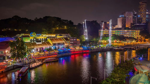 Illuminated city at night,marina bay sand singapore