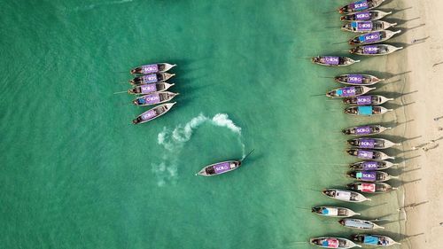 High angle view of people enjoying in boat