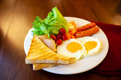 Close-up of breakfast served on table