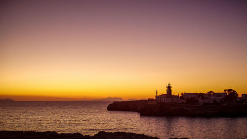 Scenic view of sea at sunset