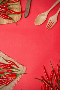 High angle view of red chili pepper on table