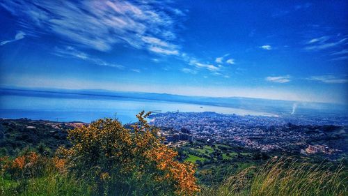 Scenic view of sea against blue sky