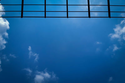 Low angle view of built structure against blue sky