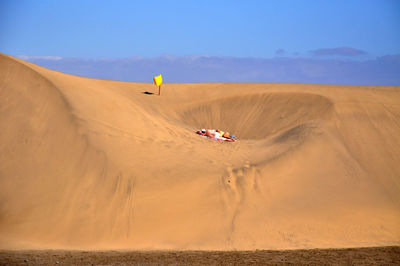 Scenic view of desert against clear sky