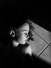 Black and white portrait of a girl looking away