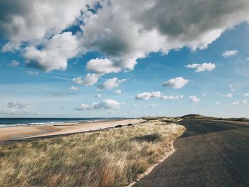 Scenic view of beach against sky