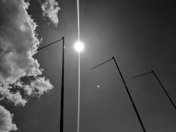 Low angle view of street light against sky